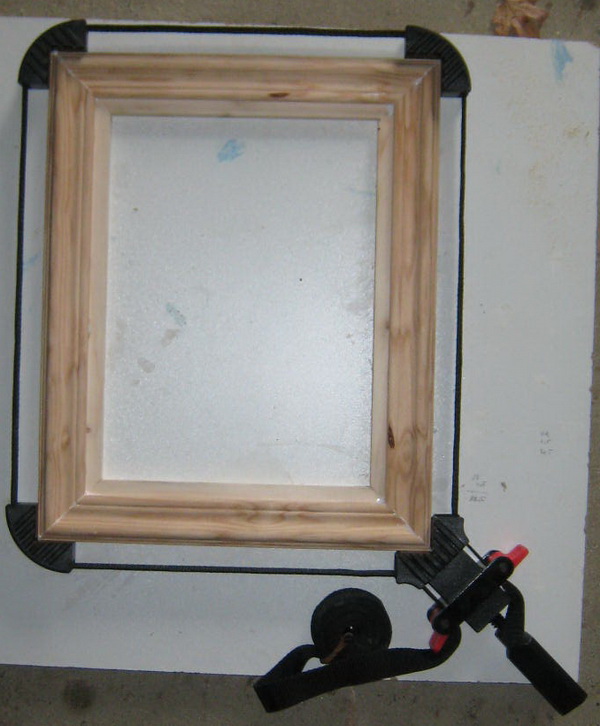 Clamping picture frame